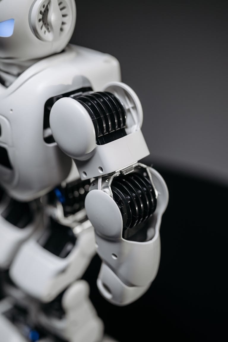 Close-up of a humanoid robot's mechanical arm showcasing advanced technology.